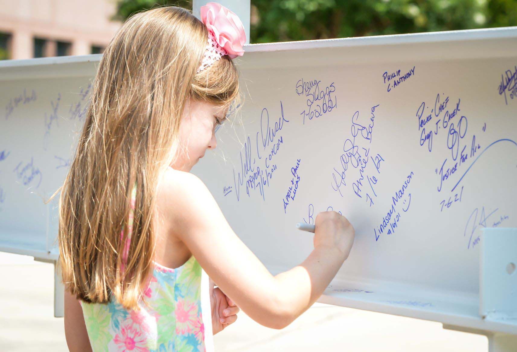Signing the beam